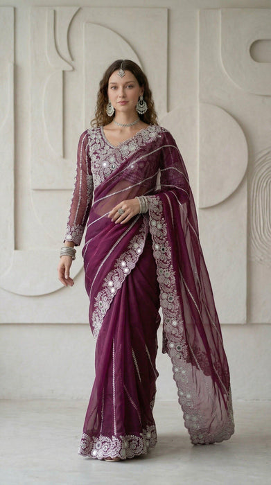 Premium And Classic Faux Georgette Designer Soft Saree With Laheriya Pattern