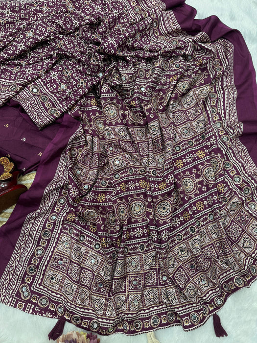 Soft crepe silk with Beautiful Ajarakh print with Zari and Real mirror work Saree