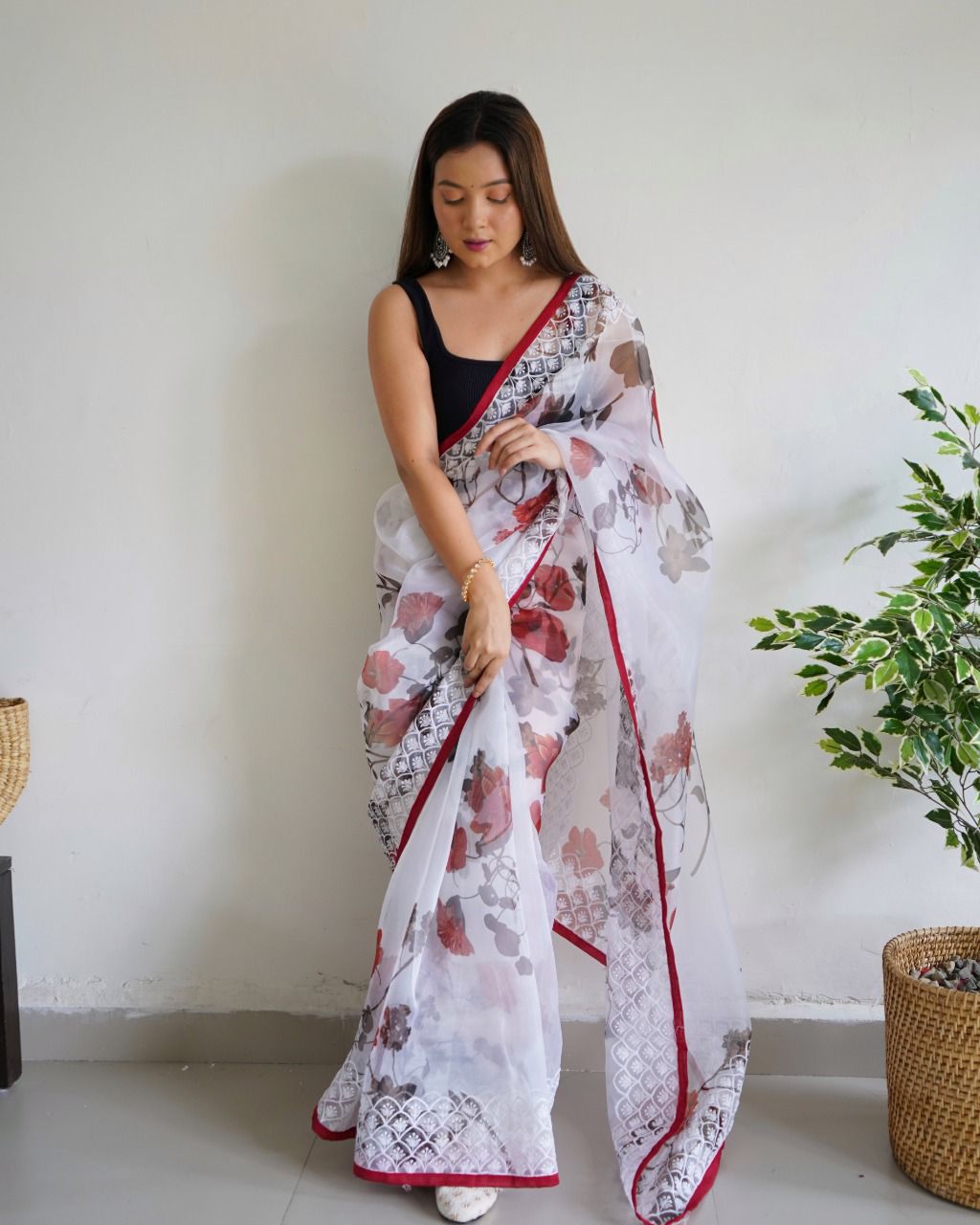 Pink Digital floral printed Georgette saree with lace attached paired up  with plain contrast black silk blouse. - Aval Fashion and Products